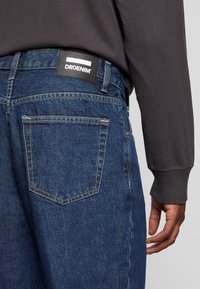 Dr.Denim OMAR - Calças de ganga de corte relaxado - pebble dark retro