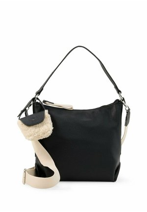 Schwarze Lederhandtasche mit kurzem Henkel und breitem beigefarbenen Schulterriemen, mit kleinem flauschigem cremefarbenem Täschchen mit schwarzer Klappe.