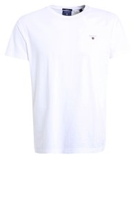 Vit bomullst-shirt med rund halsringning, korta ärmar och en liten broderad logotyp på vänstra bröstet. Slät textur, klassisk passform.