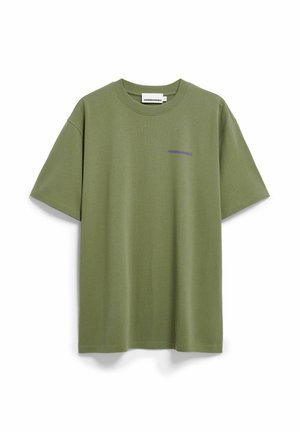 Olivengroen T-shirt van zacht katoen, met korte mouwen en een ronde hals. Op de voorkant staat een klein paars logo.