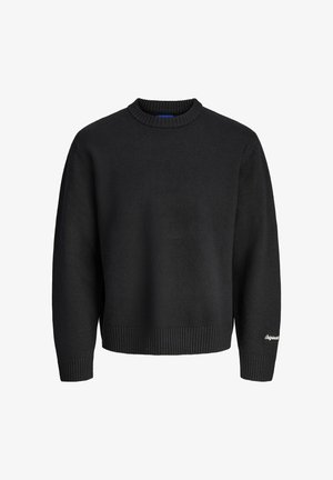 Maglione nero a maglia con scollatura a girocollo e polsini a costine. Presenta una vestibilità comoda e un piccolo dettaglio ricamato sulla manica sinistra.