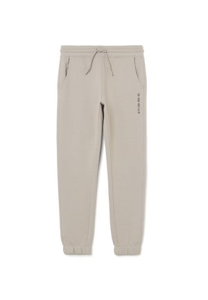 JOGGERS FIT WITH WRITING. - Pantaloni sportivi - beige marl