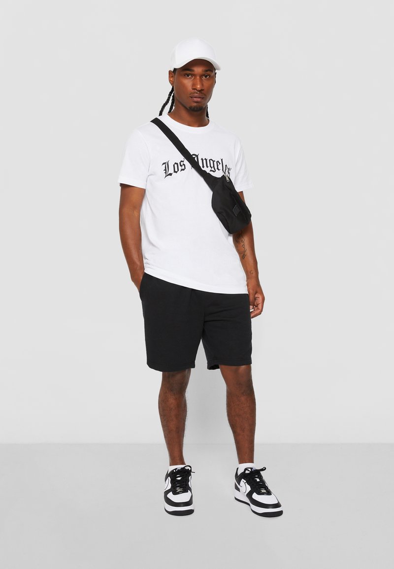 Missguided X Playboy Maglietta Oversize Con Grafica Di Los Angeles Graphic T Shirt With Crew Neck And Short Sleeves For Casual Streetwear P 386134015