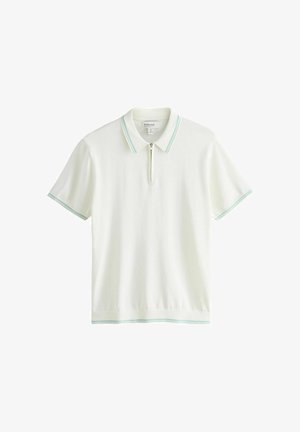 Polo bianca a maniche corte con rifiniture azzurro chiaro su colletto, maniche e orlo, con chiusura frontale a zip.