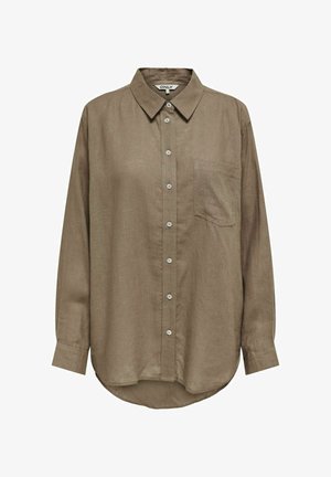 Cămașă călduță, cu mânecă lungă și nasturi, dintr-un material ușor. Are guler, un singur buzunar pe piept și margini rotunjite.