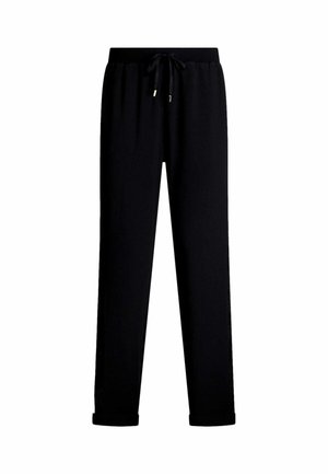 Pantaloni jogger neri con vita regolabile, gambe affusolate, polsini a coste e tessuto liscio. Design semplice senza fantasie o accenti.