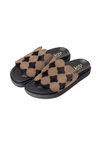 Black slide sandals feature a brown suede upper with cut-out star shapes, a flat rubber sole, and embossed brand logo on the insole.