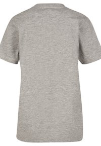 Camiseta gris de manga corta con cuello redondo, hecha de una tela suave y texturizada. Presenta un diseño trasero liso y sin adornos.