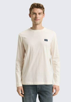 - Bluzka z długim rękawem