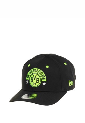Black adjustable baseball cap with neon green "BVB 09" logo, text "Die Schwarzgelben," two white stars, and New Era logo on the side.
