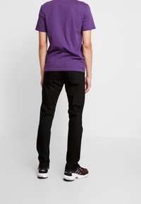 Nudie Jeans Jeans a sigaretta - black denim