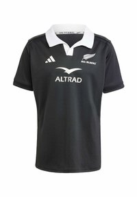 Sort rugbytrøje med hvid krave, "ALL BLACKS" logo og "ALTRAD" branding. Lavet af blødt materiale med korte ærmer.