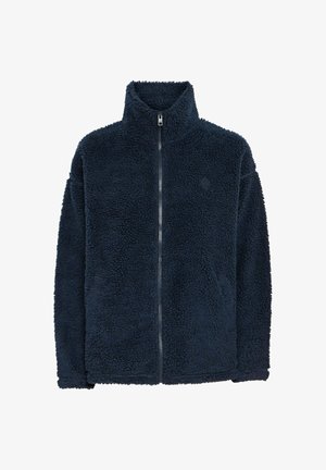 Giacca in pile blu marino con colletto alto, maniche lunghe e zip frontale completa; texture morbida e logo discreto sul petto.