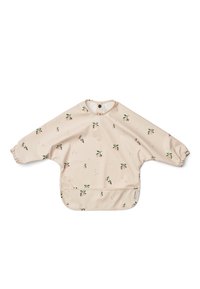 Hellbeige Langarmbluse mit grünen und pinken Früchten sowie Blattmustern. Elastische Bündchen und ein runder Ausschnitt mit einem Druckknopfverschluss auf der Rückseite.