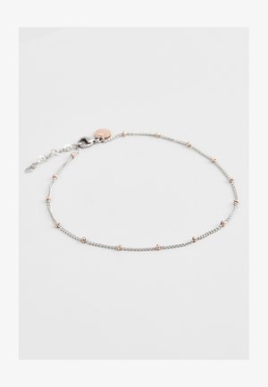 Bracelet en argent arborant une chaîne délicate avec de petites perles en or rose réparties uniformément le long de sa longueur, fermée par un fermoir mousqueton.