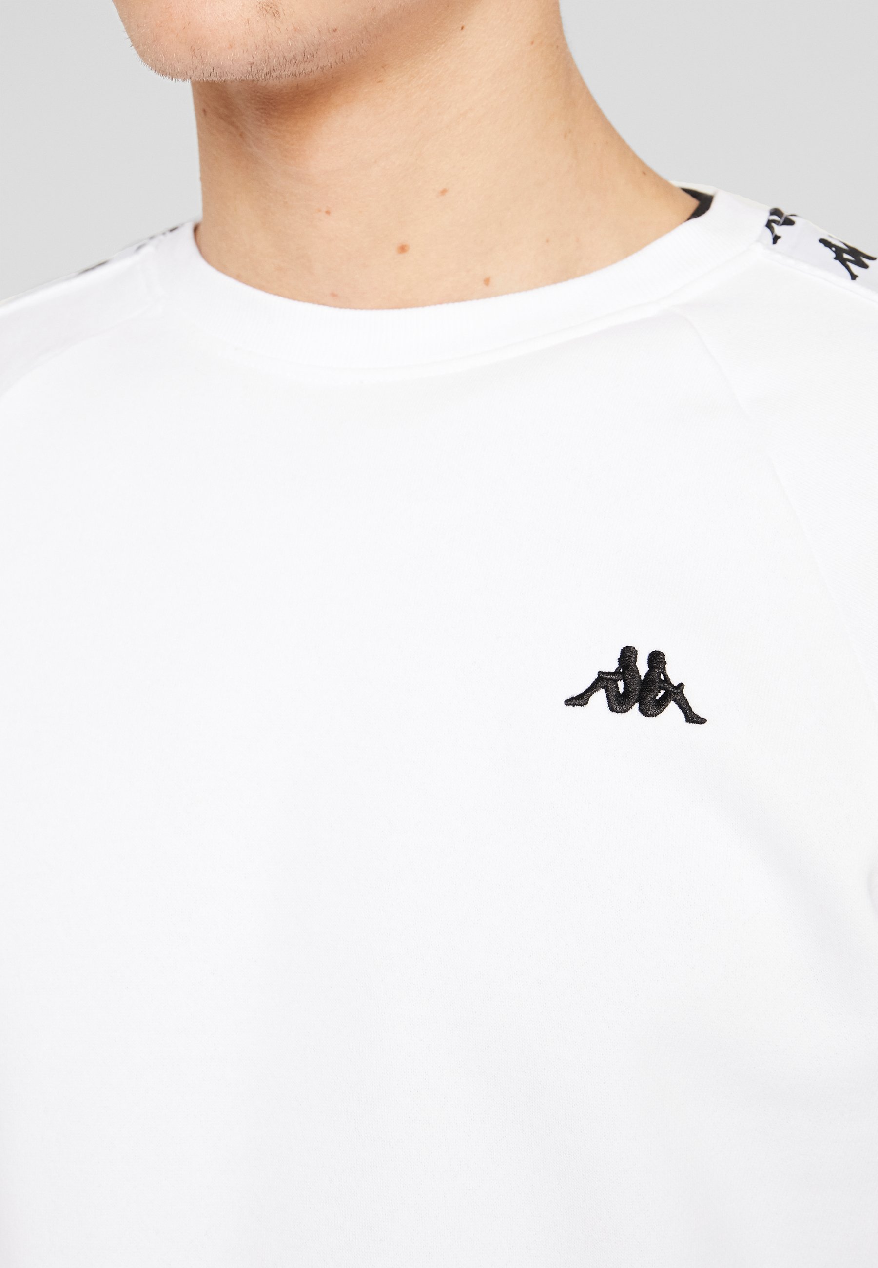 Kappa GOLOR Sweatshirt bright white Zalando.at Kappa SERTUM Sweatshirt white Zalando.at