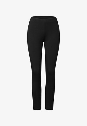 Schwarze Leggings aus dehnbarem Stoff, mit hoher Taille und einem glatten, schlichten Design in enganliegender Silhouette.