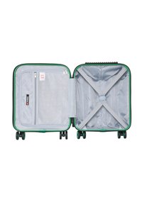 Valigia rigida verde con interni grigi, dotata di una tasca a rete con zip e cinghie di compressione incrociate. Include quattro ruote.