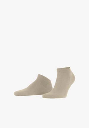 Beige Knöchelsocken aus weichem Stoff mit geripptem Bündchen und glatter Textur. Sie verfügen über ein niedrig geschnittenes Design für Komfort und Atmungsaktivität.