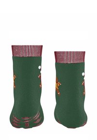 Zielone skarpetki z prążkowanym bordowym mankietem, zdobione postaciami piernikowych ludzików. Podeszwa ma ozdobny wzór drzewa. Dzianina o fakturze.