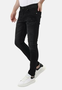 Local Fanatic MET SCHEUREN - Jeans Skinny Fit - zwart