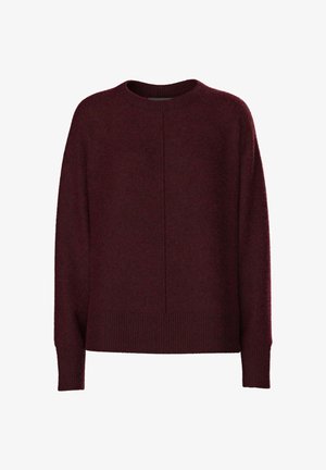 Pull en bordeaux à manches longues en tissu doux et texturé. Présente un col rond et un ourlet côtelé avec une couture centrale pour un détail de design.