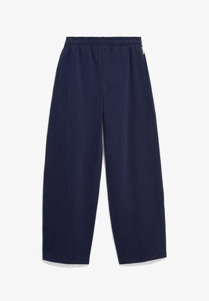 Navyblaue weit geschnittene Sweatpants mit elastischem Bund und seitlichen Taschen, flach auf weißem Hintergrund liegend.