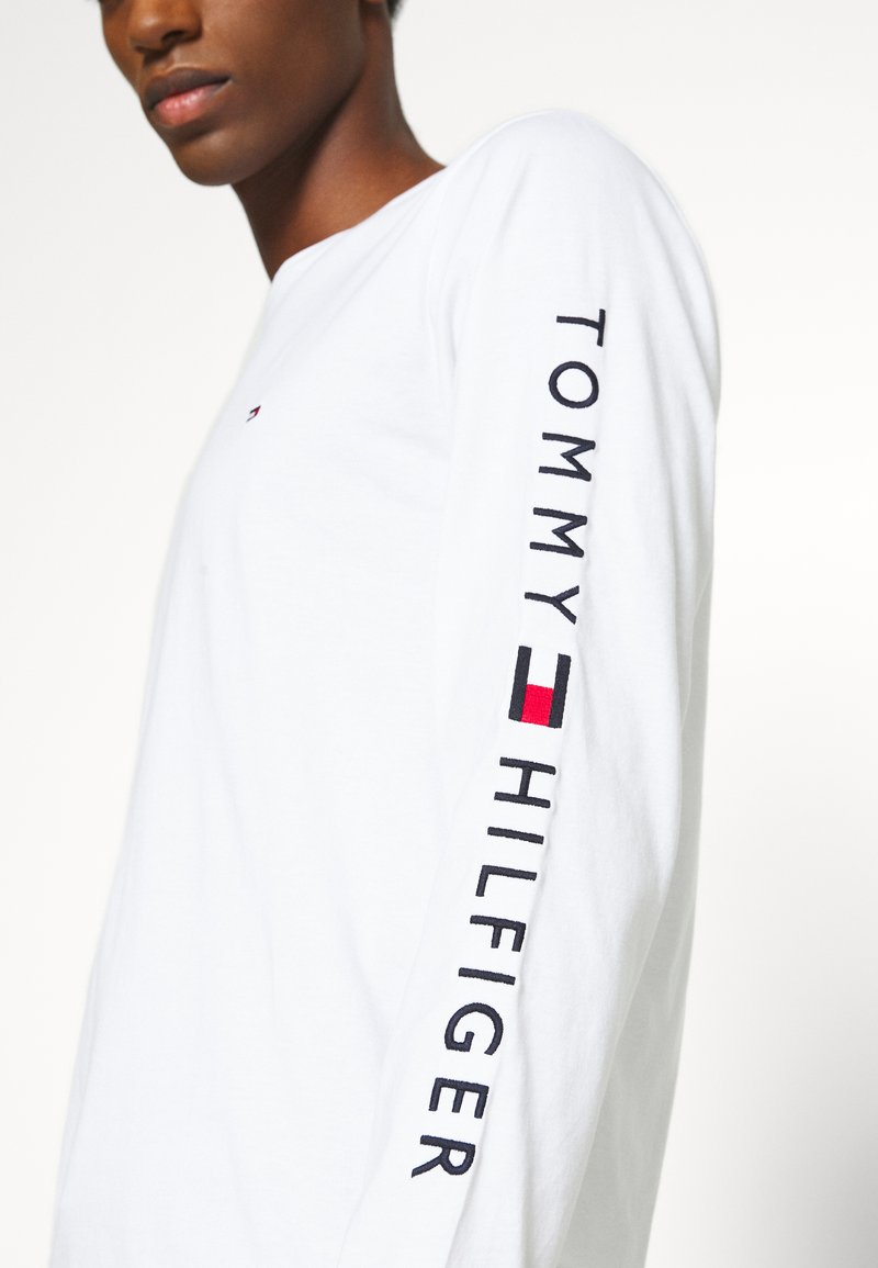 Descifrar equipo Clínica Tommy Hilfiger LOGO LONG SLEEVE TEE - Camiseta de manga larga -  white/blanco - Zalando.es