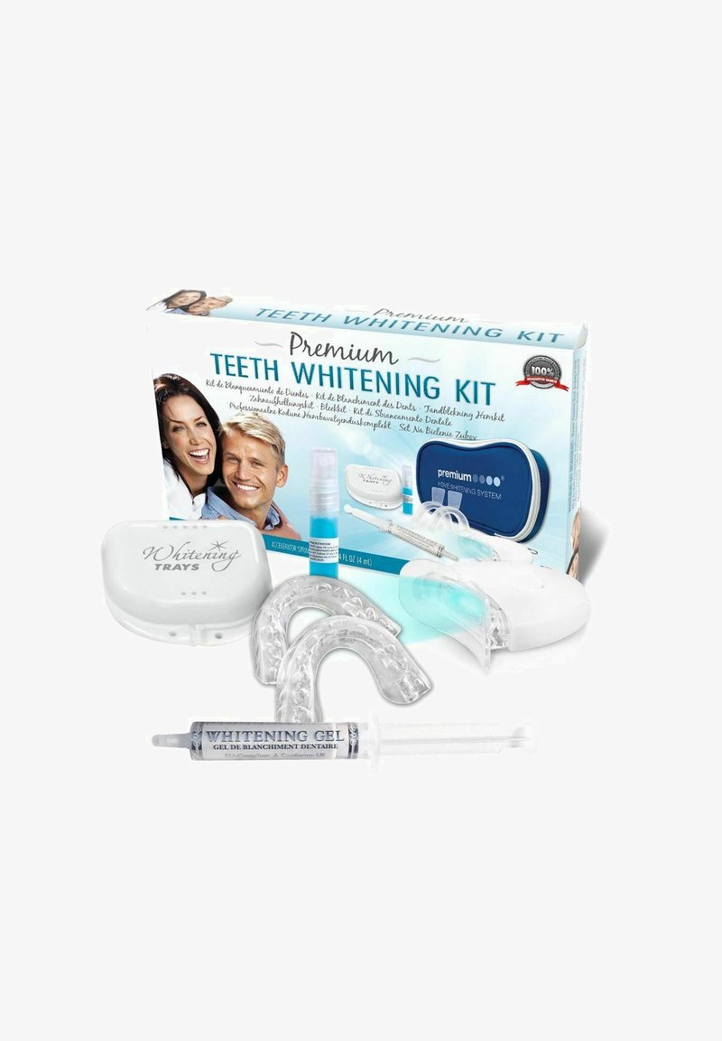 Premium valkaiseva hampaiden kit, joka sisältää kirkkaat suuvalmisteet, syöttöpistoolin valkaisugeeliä ja valkoisen säilytyskotelon, jossa lukee "Whitening Trays".