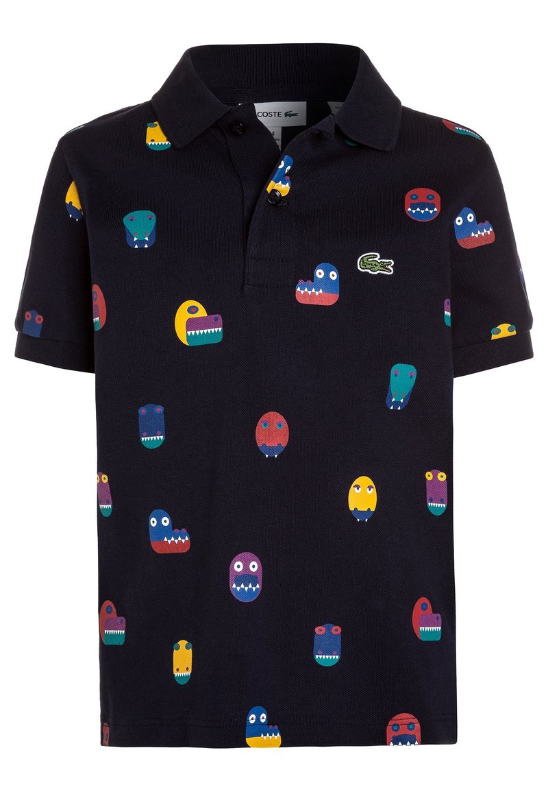 Kortärmad pikétröja i marinblått bomull, med färgglada monstertryck, en placket med tre knappar och grön logotyp-detalj på bröstet.