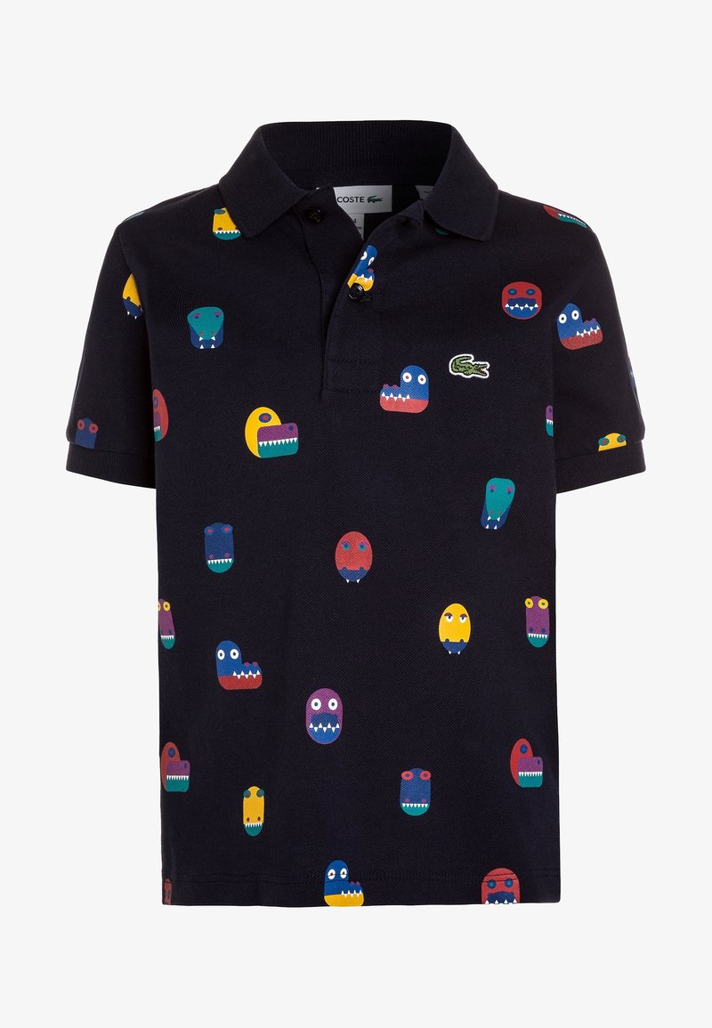 Kortärmad pikétröja i marinblått bomull, med färgglada monstertryck, en placket med tre knappar och grön logotyp-detalj på bröstet.