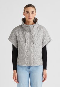 Graue Steppjacke mit kurzen Ärmeln, hohem Kragen, Reißverschluss, geometrischem Steppmuster und Kordelzügen.