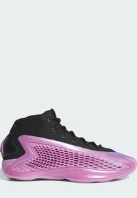 Vysoké sportovní boty s černým textilním svrškem a střední podrážkou s růžovým vzorem jako včelí plástev. Mají zaoblenou špičku a polstrovaný límec.