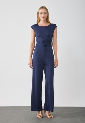Navy-blaues Jumpsuit mit Kappärmeln, einem verdrehten Frontdetail und weitem Beinausschnitt. Gefertigt aus glattem, elastischem Material für eine enganliegende Passform.
