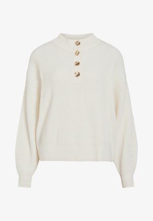 Cremefarvet ribstrikket sweater med ballonærmer og fire guldskallignende knapper på den høje kraveåbning.