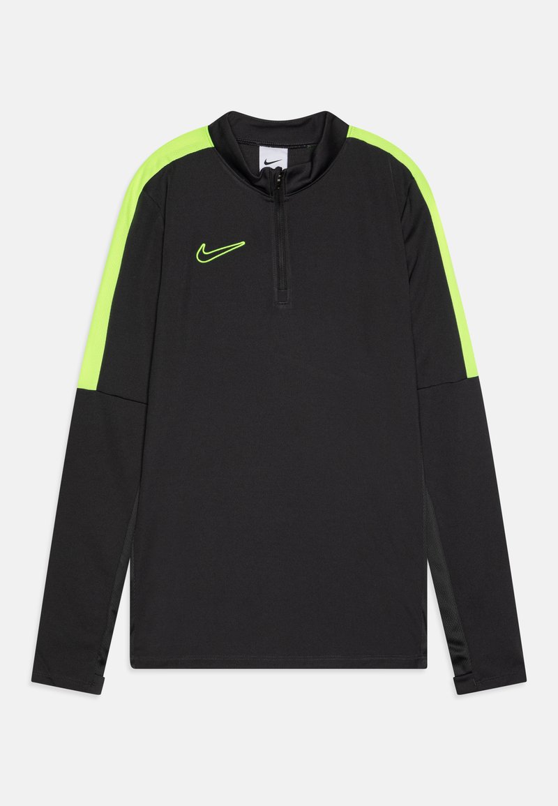 Nike træningstrøje i sort med lysegrønne accenter. Har en høj krave, halv-lynlås lukning og lange ærmer med kontrasterende ærmepaneler.