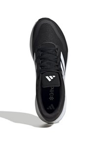 Black athletic shoe with a breathable mesh upper, laces, and notable three white stripes. Cushioned sole for comfort.