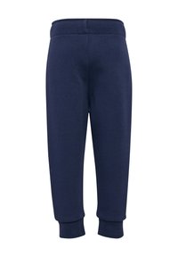 Granatowe dresy wykonane z miękkiego materiału, z prążkowanym pasem w talii i mankietami, o prostym kroju nogawki. Bez kieszeni ani ozdób.