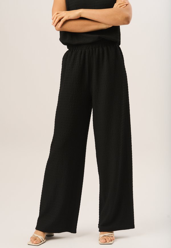 TEXTURED ELASTIC WAIST PULL ON - Trousers