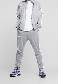 Nike Sportswear Träningsbyxor - dark grey