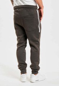 Just Rhyse BIG POCKET TECH - Tracksuit bottoms - anthracite