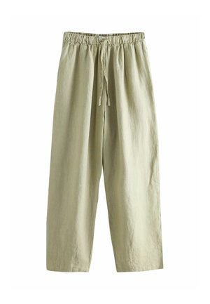 Jasnobeżowe spodnie o szerokich nogawkach z elastycznym pasem i sznurkiem z przodu, wykonane z teksturowanej tkaniny.