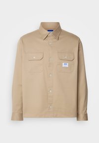 Unselected, medium beige