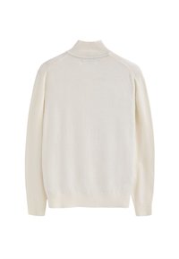 Krämfärgad tröja med hög krage, ribbade ärmslut och kant, tillverkad av mjukt stickat material. Minimalistisk design utan mönster.