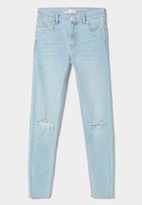 Světle modré skinny džíny z denimu, s potrhanými koleny, standardním designem s pěti kapsami a surovým lemem na kotníku.