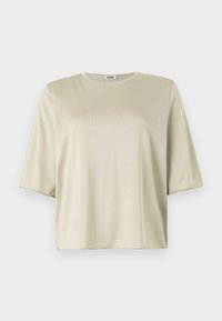 Short-sleeve, loose-fitting top in light beige, featuring a round neckline and soft texture, made from a smooth, lightweight material.