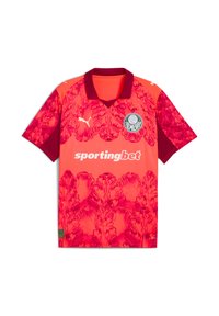 Camiseta de fútbol de manga corta en rosa y rojo con un patrón floral, un cuello negro y un logo circular con "PALMEIRAS" en el lado izquierdo del pecho.