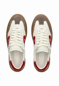 Leather sneakers featuring a white body, gray suede accents, red logo, and a brown rubber sole, with flat white laces.