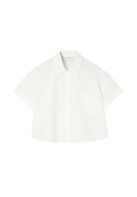 Short-sleeve, cropped shirt in white fabric. Features a classic collar and a single chest pocket. Smooth texture with a minimalistic design.