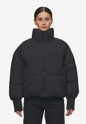 Black puffer jacket with high collar, zip closure, and ribbed cuffs. Features quilted sections and subtle branding on chest.